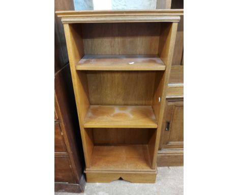 A 48.5cm stained mixed wood three shelf open bookcase