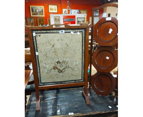 An oak framed firescreen with antique Chinese embroidered silk panel under glass - sold with a 1930's stained oak three tier 