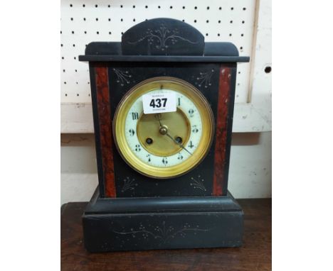 A late Victorian black slate and red marble cased mantel clock with eight day gong striking movement