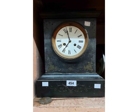 A late Victorian black slate cased mantel clock with eight day gong striking movement - glass missing