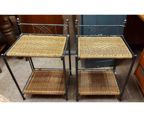 A pair of modern metal framed folding shelf units with woven surfaces