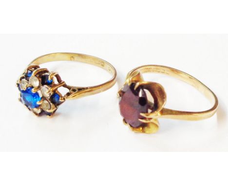 A vintage 9ct. gold and garnet solitaire ring - sold with a 375 (9ct.) gold paste set ring - sizes L and N respectively