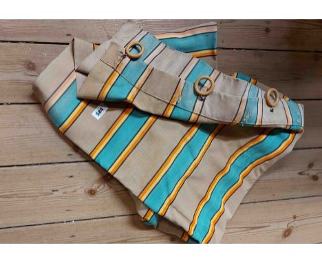 A vintage canvas curtain made from striped deckchair material
