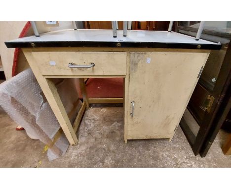 An 87cm vintage enamel topped kitchen preparation unit with frieze drawer and cupboard to painted base, set on square support