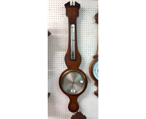 An antique inlaid mahogany framed banjo barometer/thermometer with shell and rosette motifs, the silvered dial marked for F. 