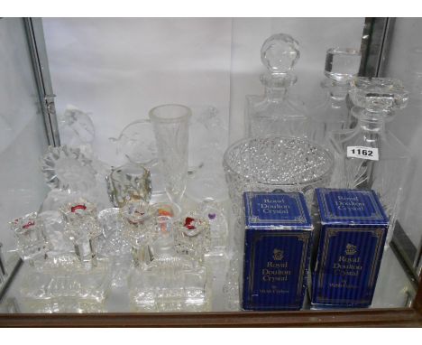 A quantity of assorted glass and other items including dolphin paperweights, moulded candlesticks, decanters, boxed Royal Dou
