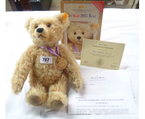 A Steiff 2003 Teddy Bear with gold plated medallion, button in ear, tag, certificate and paperwork