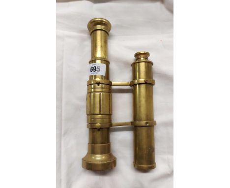 A vintage large brass double gun sight