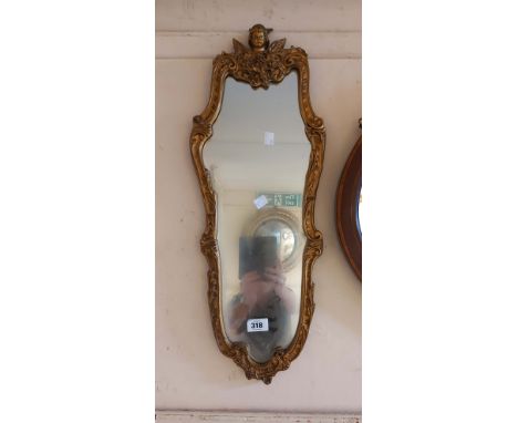 A small vintage Aisonea ornate gilt framed wall mirror with Rococo border and shaped plate