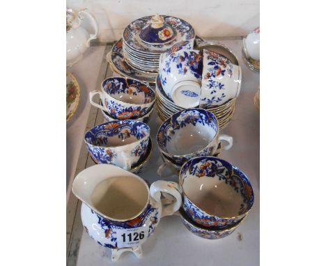 A Victorian part tea set decorated in the Amhurst pattern including cups and saucers, plates, etc.