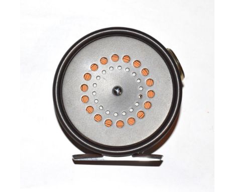 A Hardy Prefect 3 3/8'' Trout Fly Reel with ceramic line guard.