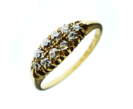 18ct gold ten stone diamond set dress ring, size R½   Condition: 