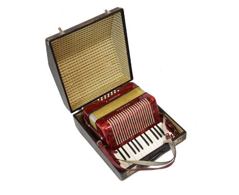 Hohner Student II accordion having red case and faux crocodile carry case   Condition: 