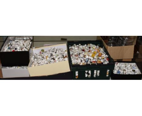 Vast collection of mainly ceramic collectors thimbles, together with a quantity of stands etc   Condition: 