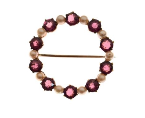 9ct gold circular seed pearl and amethyst coloured stone set brooch   Condition: 