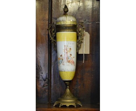 Early 20th Century tapered cylindrical ceramic vase and cover having brass mounts   Condition: 