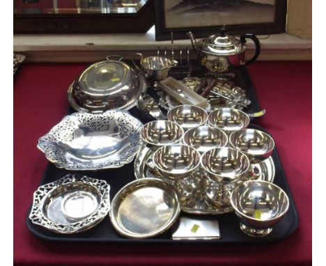 Plated three piece tea set, tureen, ladle, toast rack, trays, two corkscrews, three silver pickle forks etc. Condition Report