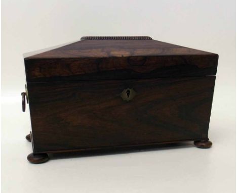 Regency rosewood veneered sarcophagus shaped tea caddy with fitted interior. Condition Report: see terms and conditions.