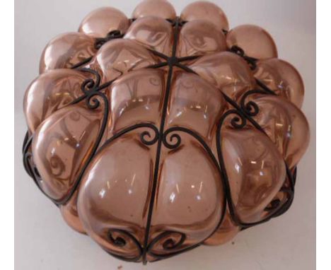 Amber glass and wrought iron hanging centre light. Condition Report: see terms and conditions.