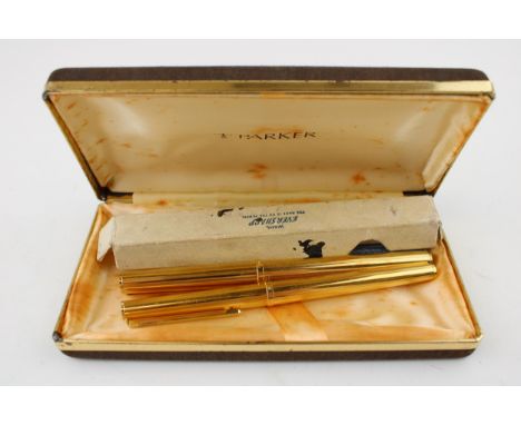 A Parker gold plated fountain pen with gold nib and a gold plated Parker rollerball pen &amp; a gold filled Wahl Eversharp pr