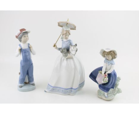 A collection of figures to include LLadro / Nao 'Girl Holding Dog' a/f, 'Boy from Madrid' together with 5222 'Pretty Pickings
