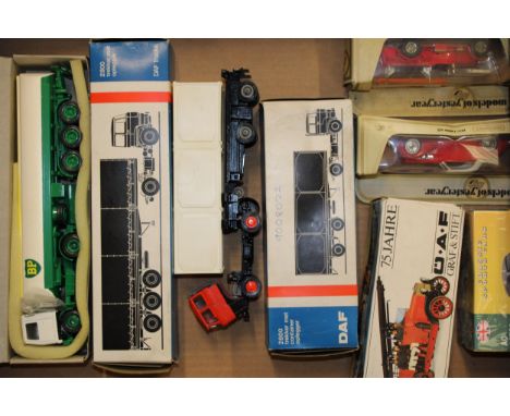 A collection of boxed vintage die cast vehicles to include DAF trucks Lion Car Nr. 70, Lion Car Nr. 61 together with a Conrad