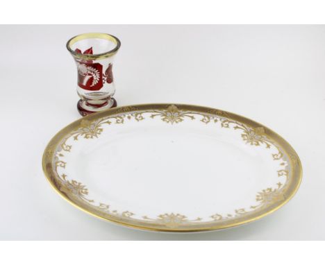 A De Lamerie oval plate with gilt decoration. 40cm x 31cm. Together with a vintage Bohemian Gilt Ruby glass / Cranberry glass