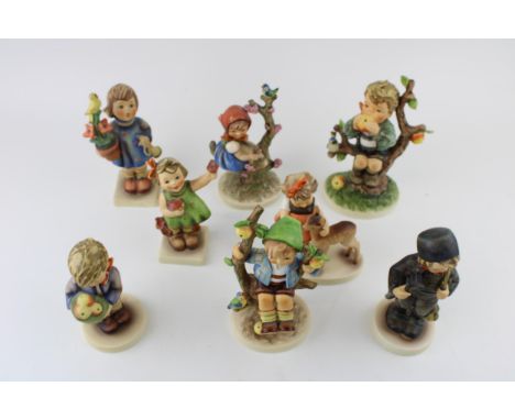A collection of Goebel figures to include An Apple A Day, Boy with Ladders, Friends, Girl with Flowers, Girl in Apple Tree, A