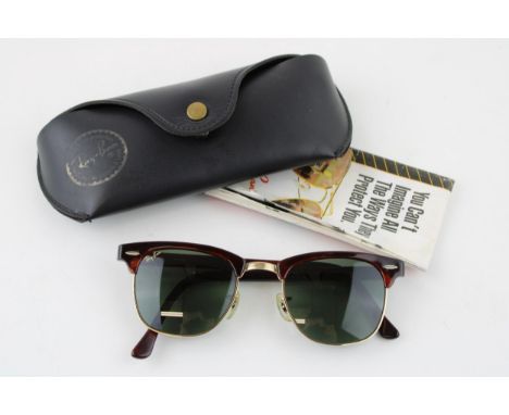 A pair of vintage ladie's Ray-Ban Wayfayer sunglasses. Tortoise shell W0366 style frame with Bausch & Lomb lenses. Original p