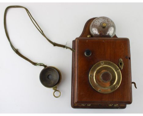 An early c20th vintage wooden mahogany wall or signal box telephone with serial number 028515  the item is in generally very 