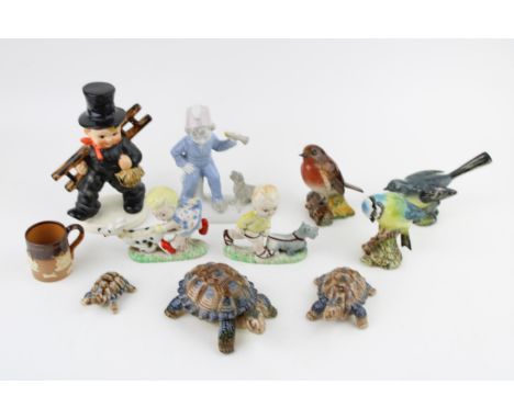 A mixed collection of ceramics to include Goebel Chimney Sweep, Beswick Birds (3) Wade Ceramics and other similar items. (Qty