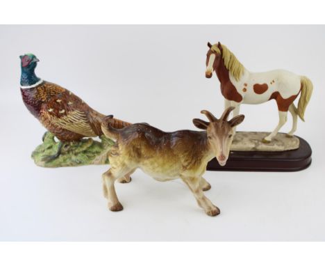 Pottery to include a Beswick Pheasant (nip to base), a Melba Ware goat and a Leonardo horse (3).  Good condition.