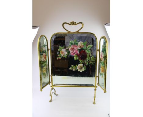 An Edwardian Art Nouveau style brass mirrored and hand painted fire screen  excellent original condition 63 cm by 70 cm