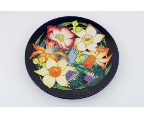 Moorcroft 'Golden Jubilee' pattern limited edition 2002 year plate designed by Emma Bossons, no 437/750. Diameter approx 22.5