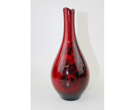 Royal Doulton Flambe bottle vase Woodcut 1612. Decorated with a scene of man hunting with dog in a country landscape. Height 