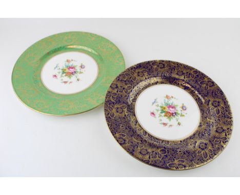 A pair of Minton cabinet plates decorated with floral sprays, one in cobalt blue ground and gilt decoration, one with jade gr