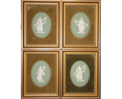 Four Wedgwood Japserware oval plaques of muses in sage green. Impressed mark to reverse, in gilt frames. Plaque dimensions 13