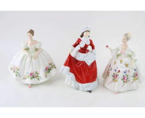 A trio of Royal Doulton figures to include 'Diana' HN 2468, 'Samantha' HN 3304 together with Pretty Ladies 'Winter' HN 5314. 