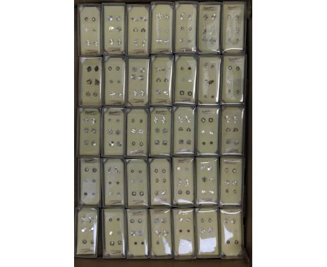 A large collection of new old stick sterling silver earrings, in plastic / cardboard cases, generally 3 pairs per box (35). B