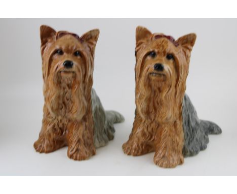 A pair of Beswick Fireside Yorkshire Terriers. Height 27cm.  Both of first quality earlier model good, later model with sligh
