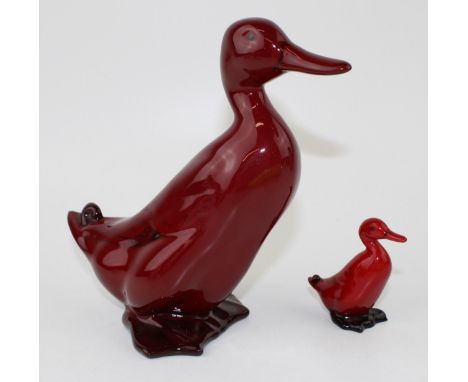 Two Royal Doulton flambe ducks to include the larger version and a miniature version (2), 16.5cm tall.  In good condition, so