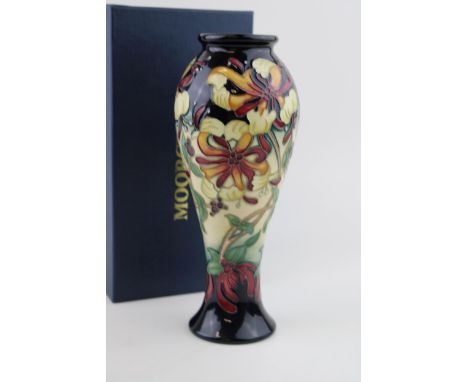 Boxed Moorcroft Honeysuckle Haven trial vase, high shouldered, first quality, 21cm tall.  In good condition with no obvious d