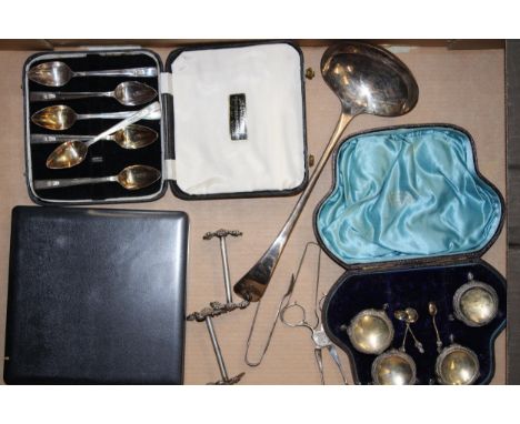 A mixed collection of silver plated items to include cased silver spoons and salts together with a large ladle. (Qty)
