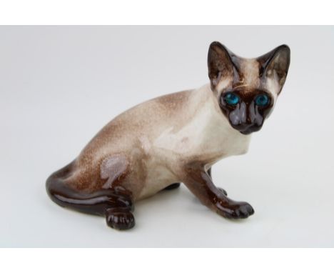 Winstanley pottery Siamese cat, 28cm wide.  In good condition with no obvious damage or restoration.