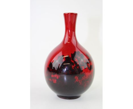 Royal Doulton Flambe bottle vase Woodcut 1606. Decorated with a country landscape. Height 12cm.  Of first quality with no obv