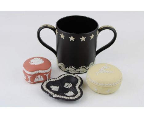 Wedgwood Jasperware to include a crimson trinket dish, a prunus primose trinket dish, a black clubs pin dish and a black Rich