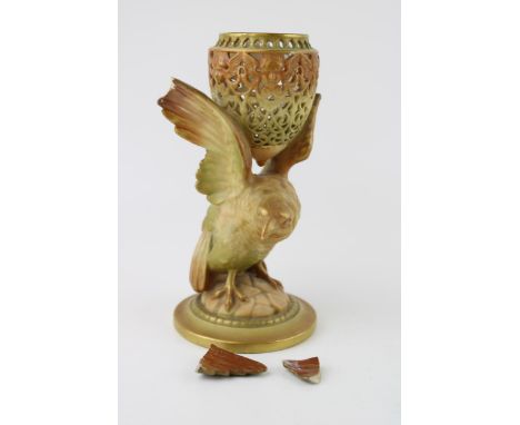 Royal Worcester blush ivory porcelain eagle pot pourri pot, the reticulated pot raised upon the outstretched wings of an eagl