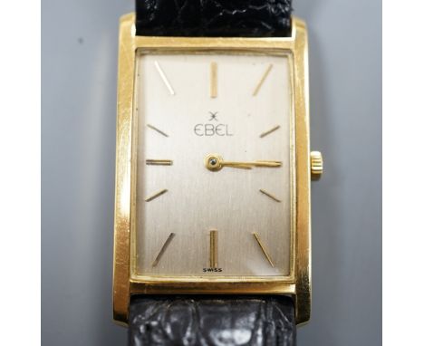 A gentleman's 750 yellow metal Ebel rectangular dial manual wind wrist watch, 0on associated leather strap, case diameter 22m