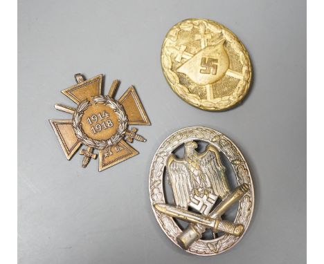 A WW2 German Army / Waffen-SS General Assault Combat Badge in Silvered brass and a Third Reich Wound Badge in Gilt, together 