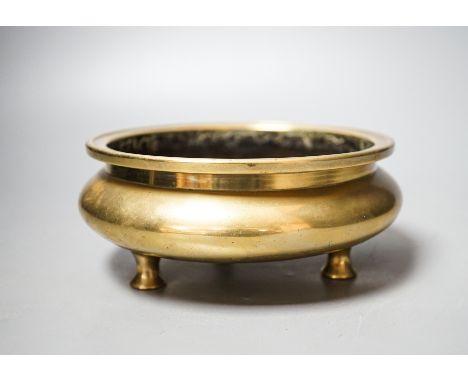 A Chinese bronze censer, ding, Xuande mark, 18th / 19th century, diameter 16.6cm, height 6.7cm